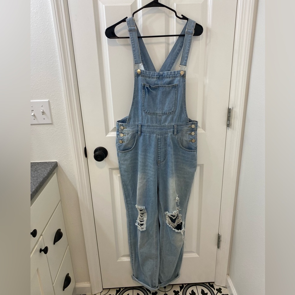 Women’s denim jean overalls, distressed